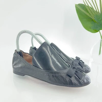 Zapatos planos de ballet de cuero con lazo arrugado negro Stuart Weitzman Raven para mujer talla 6 Foto 1 de 4