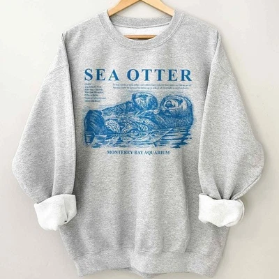 Monterey Bay Aquarium Sea Otter Vintage 90s Unisex Sweatshirt Ash Color S–5XL - Image 1 of 4