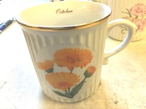 Original porcelain OCTOBER CALENDULA FLOWER  MUG w/gold trim 3.5" -WW ship - Picture 1 of 1