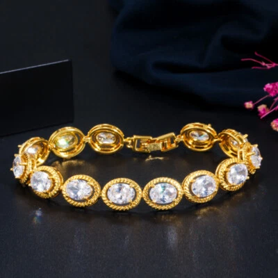 Pulsera de circonitas cúbicas redondas chapadas en oro amarillo de 18k brillante para boda nupcial Foto 1 de 4