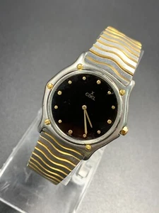 Reloj de cuarzo vintage Ebel clásico ondulado medio dorado negro 14800194 781903 para hombre 33 mm - Imagen 1 de 23