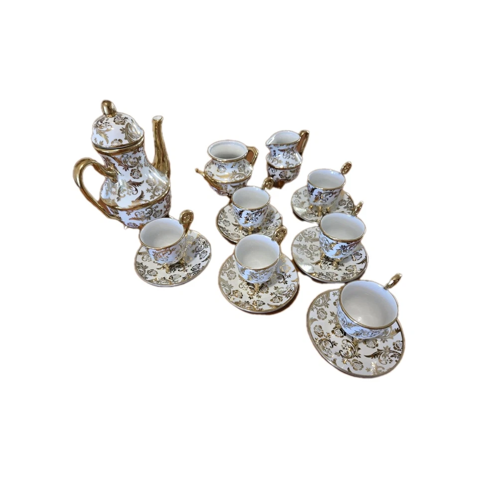 Juego de 15 piezas de espresso o té de porcelana dorada y blanca Foto 1 de 4