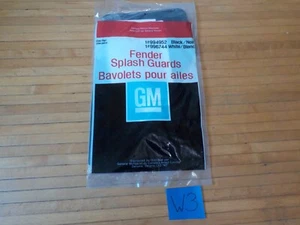 NOS GM FENDER SPLASH GUARDS BLACK 994952 PAIR 1992-93 Chevy Metro - Picture 1 of 3