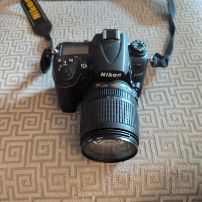 'AS IS'' Nikon D7000 DSLR Camera Body – Tested, AC100V with Nikon 18-105 lens  - Image 1 of 4