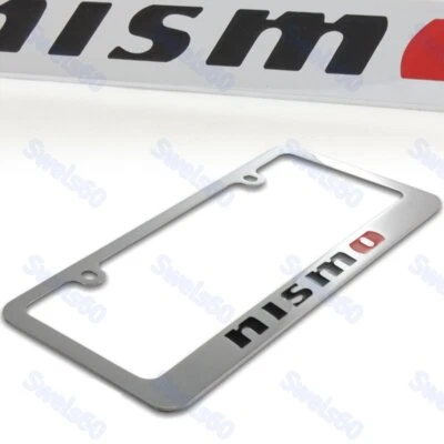 Marco de matrícula de latón cromado con 2 tapas negras con logotipo de Nissan NISMO Foto 1 de 2