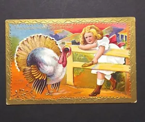 Thanksgiving Greeting Girl Feeding Turkey Corn Gold Embossed c1910s Postcard - Picture 1 of 7