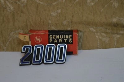 NOS GENUINE TOYOTA トヨタ CORONA MARK 2 RX12 “2000” REAR EMBLEM BADGE # 75362-95402 - Image 1 of 4