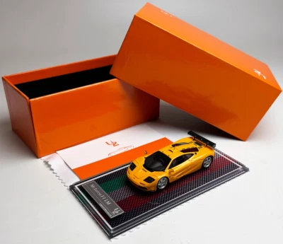 Coche de resina diecast modelo deportivo súper carreras U2 1:64 F1 LM Foto 1 de 4