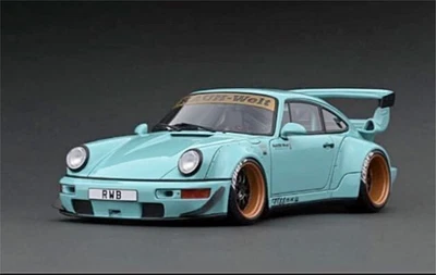 Mini auto in resina blu chiaro modello accensione 1/18 Porsche RWB 964 nuova - Immagine 1 di 4