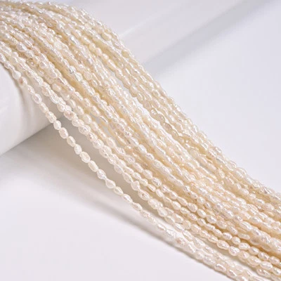 Natural White Fresh Water Pearl Baroque Rice Beads 2.5-2.8x4-5mm 14.5'' Strand - Image 1 of 2