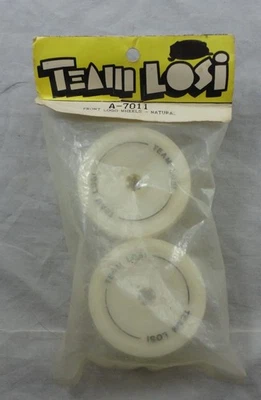 Ruedas delanteras con logo natural de buggy 1/10th del equipo Losi XX (2pcs) LOSA7011 Foto 1 de 2