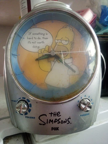 Simpsons Homer alarm clock. Untested. As-is. No battery cover Cover