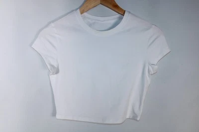 Top corto blanco manga corta ALO Yoga para mujer SIN TALLA Foto 1 de 4