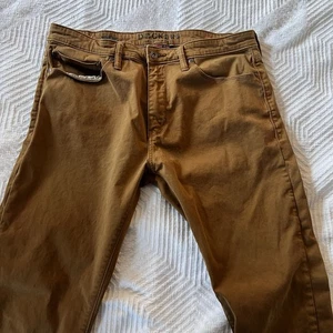 Dockers Alpha Khaki Slim Fit Pants Dark Khaki Men’s 34x34 Supreme Flex EUC - Picture 1 of 5