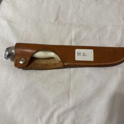 ¡Cuchillo de caza Cutco 1769 blanco dentado con funda! Foto 1 de 3