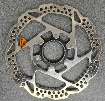 Rotor de freno de disco Shimano SM-RT54-SE 160 mm, bloqueo central, anillo de bloqueo de ranura externa Foto 1 de 2