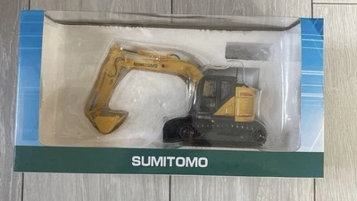 Sumitomo SH135X Backhoe Excavator Miniature Construction Model Yellow - Image 1 of 4