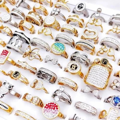 Venta al por mayor 100 piezas/lote anillos de acero inoxidable hombres mujeres titanio regalo encanto joyería Foto 1 de 4