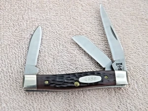 1986 CASE XX MADE IN USA 4 DOT JIGGED BROWN DELRIN STOCKMAN KNIFE 63033 SS NEW - Picture 1 of 4