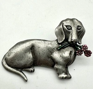 "JJ" Jonette Jewelry Silver-Pewter Colored DACHSHUND Carrying Pink Flowers Pin - Picture 1 of 5