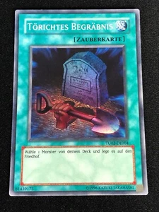 YUGIOH FOOLISH BURIAL TU02-DE004 SUPER RARE (GERMAN) (LP) TU02-EN004 - Picture 1 of 1