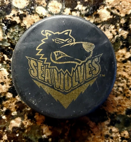 Mississippi Sea Wolves Stateless Gold Bearded Wolf ECHL Hockey Puck OrangRev Cover