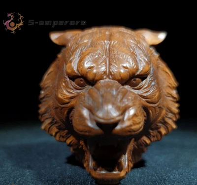 Estatuas antiguas chinas de madera de boj talladas a mano con cabeza de tigre Foto 1 de 4