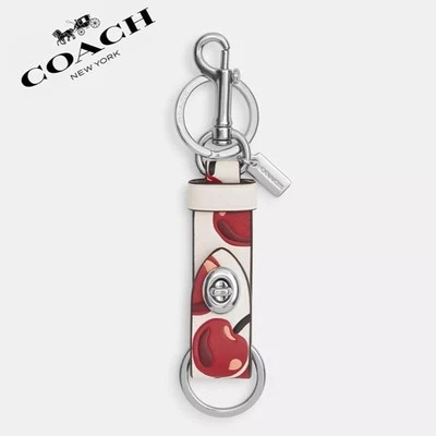 NUEVO CON ETIQUETAS ❤️ Dije de bolso a presión con estampado de cereza Foto 1 de 4