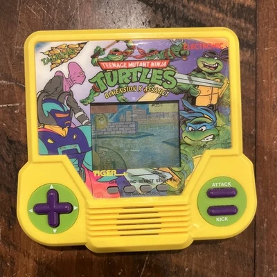 Vintage Tiger TMNT Dimension X Assault Handheld Game 1995 – turns on - Image 1 of 2