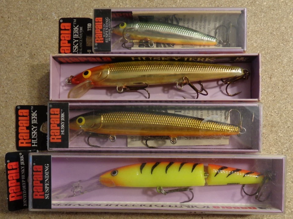 Lot of 4 Rapala Husky Jerk Minnow HJ-8 HJ-12 JDHJ-12 Jerkbait Fishing Lures - Image 1 of 1