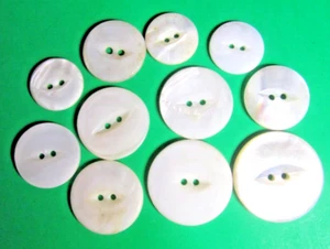 (11) VINTAGE 3/4"-1&1/4" WHITE PEARL SHELL 2-HOLE BUTTONS-9/65 - Picture 1 of 2