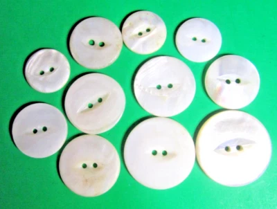 (11) VINTAGE 3/4"-1&1/4" WHITE PEARL SHELL 2-HOLE BUTTONS-9/65 - Image 1 of 2