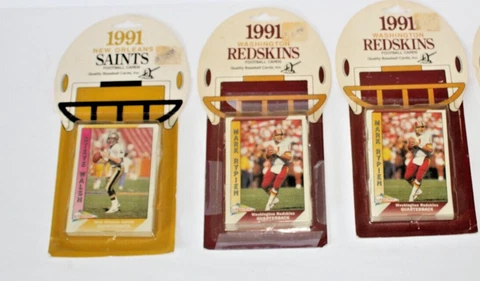 Lot of 3 1991  Football cards in sealed package , Redskins and Saints Cover