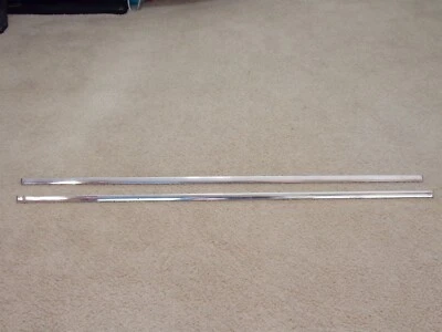 Par de molduras de panel de puerta satélite Plymouth 1965 65 OEM  Foto 1 de 4