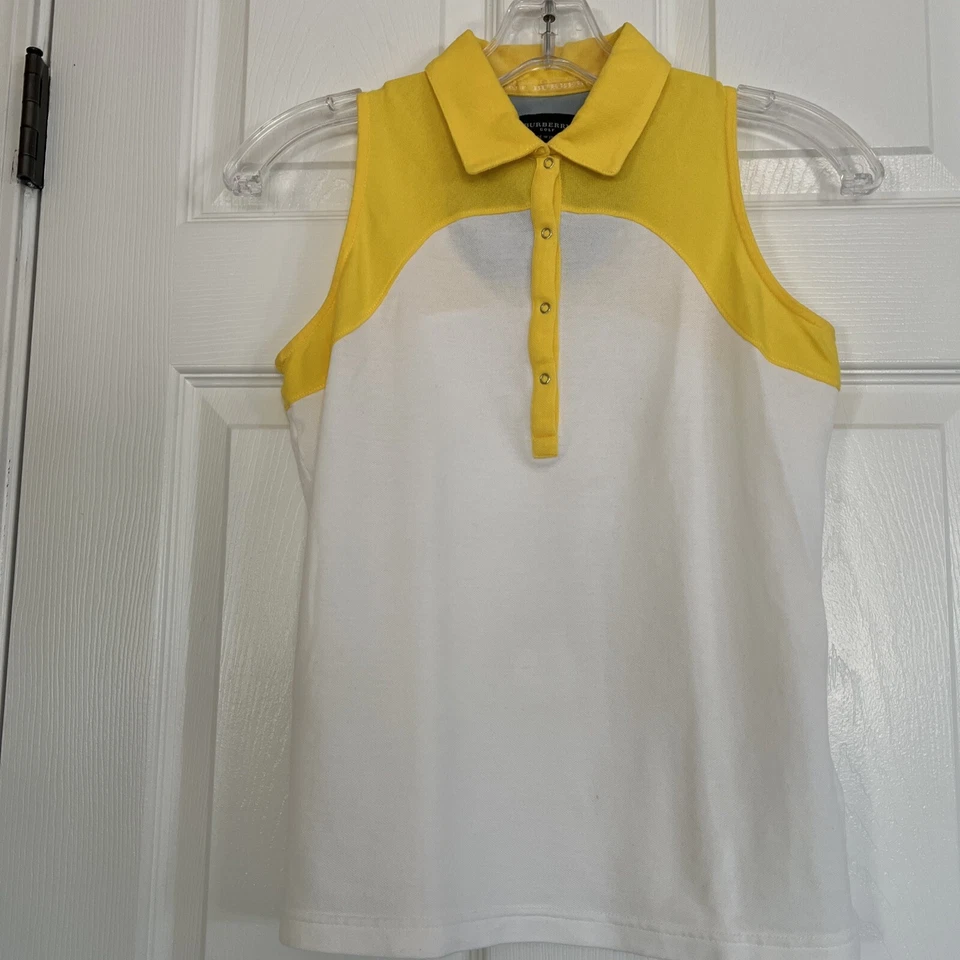 Camisa Burberry Golf Sin Mangas Halter Cuello Blanco y Amarillo XS ITALIA Foto 1 de 4
