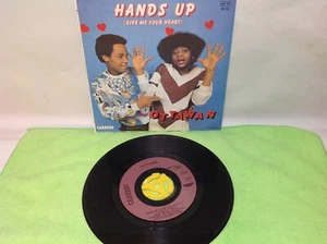 Ottwan - Hands up / Hands up Instumental - 7" 45 RPM Vinyl Record - Imagen 1 de 3