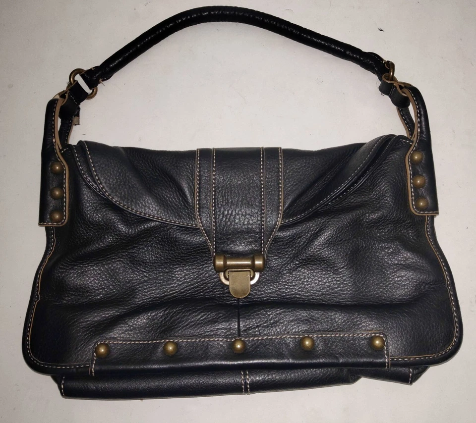 Cartera de mano de cuero negra Maxximum Foto 1 de 4