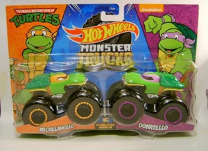 MICHELANGELO VS DONATELLO TURTLES 2 PACK MONSTER TRUCKS HOT WHEELS DIECAST 2023 - Picture 1 of 2