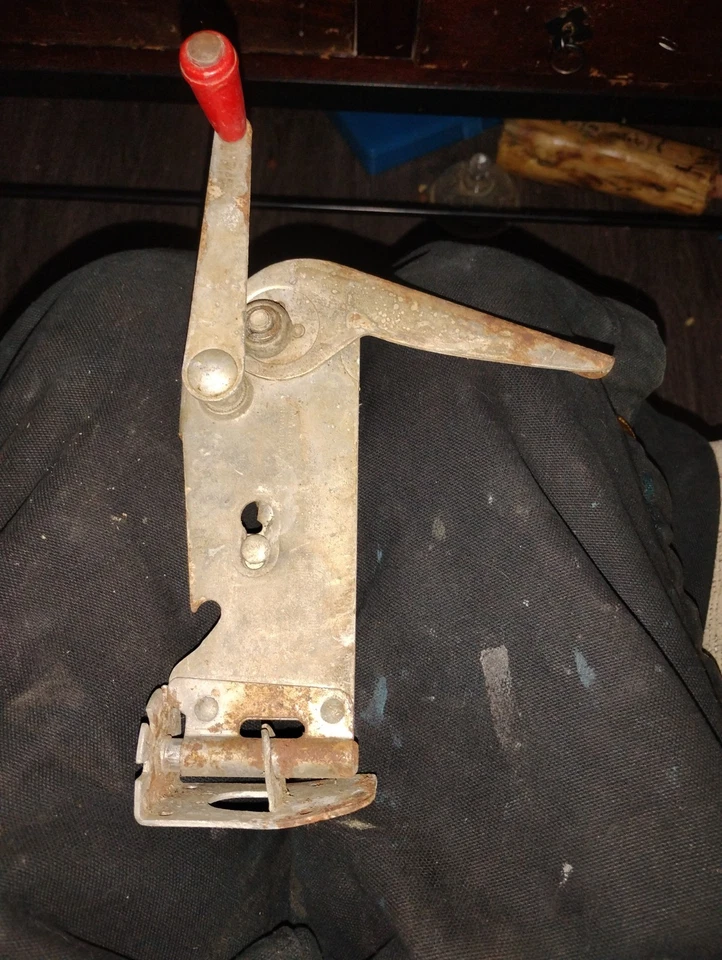 Vintage Swing-Away Manual Wall Mount Can Opener with Red Handle and Bracket - Image 1 of 4