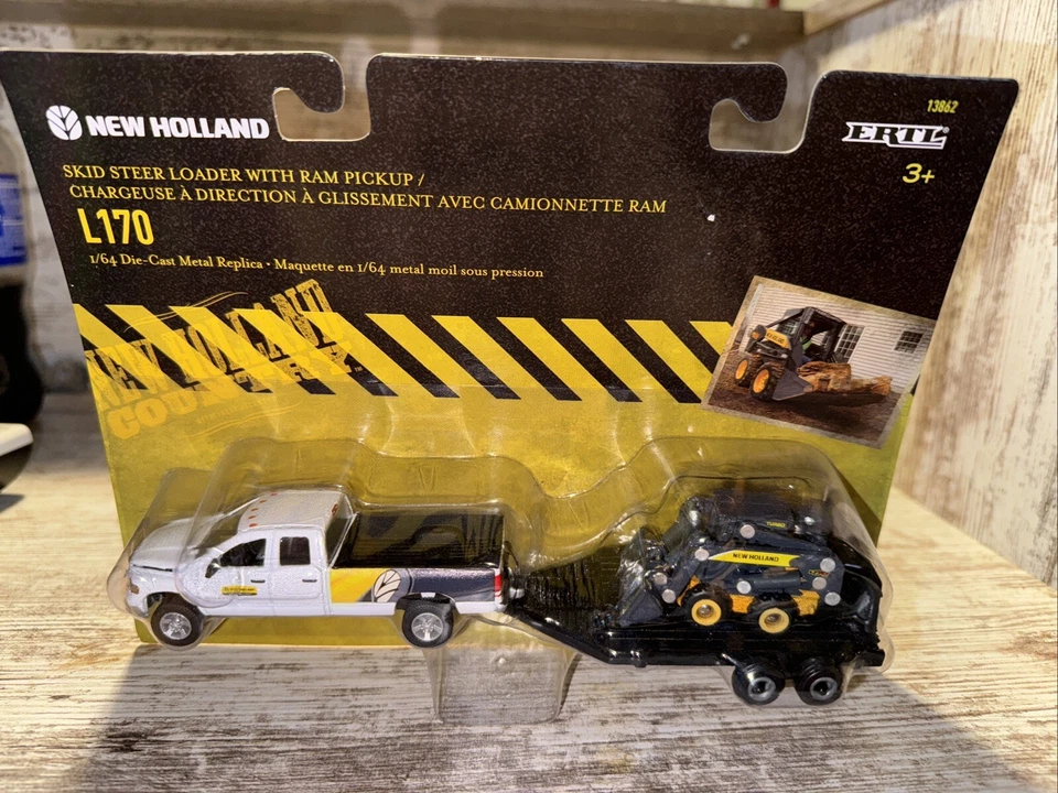 1/64 Scale New Holland L170 Skid Steer With Dodge Truck & Trailer Ertl - Image 1 of 4