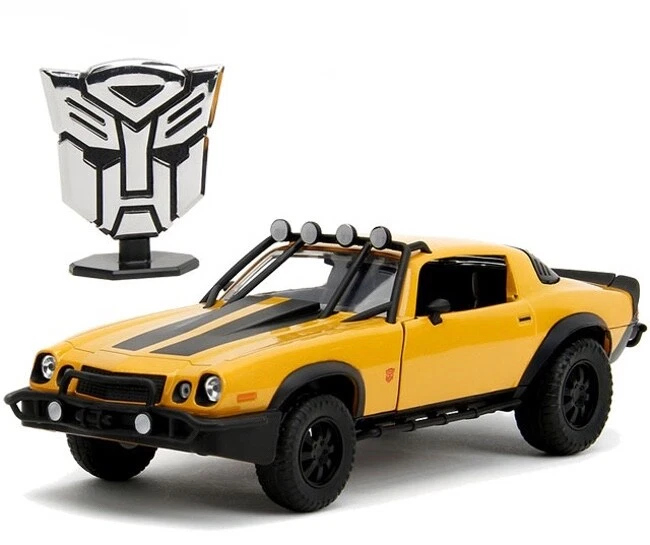JADA TOYS Yellow 1977 CHEVROLET Camaro with TRANSFORMERS Badge 1/24 JAD34263