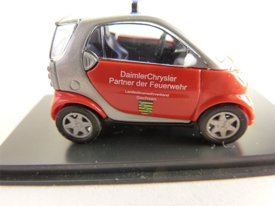 Busch Smart 489313 1/87 City Coupe vigili del fuoco Sassonia auto HO NUOVO - Immagine 1 di 3