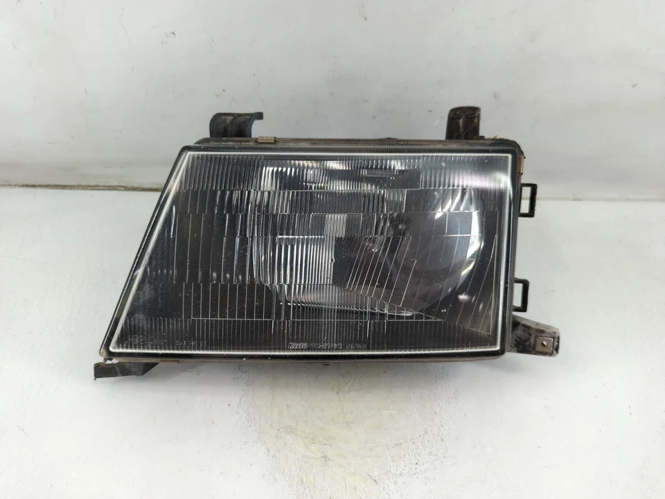 Montero Sport 1997 pasajero derecho OEM luz principal faro lámpara MUYRC Foto 1 de 4