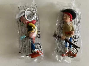 Lucky luke - 2 porte-clés lucky luke calamity jane - neufs sous blister - Imagen 1 de 1