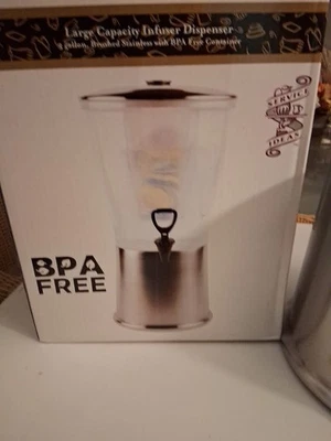 Exquisito dispensador de bebidas de 3 galones con innovadora columna de hielo e infusor de frutas Foto 1 de 4