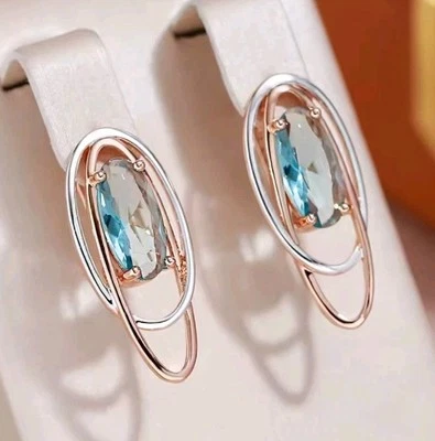 Luxus Ohrringe Huggie 585er Rolled Roségold Walzgold Blau Zirkon Bicolor Oval - Bild 1 von 4