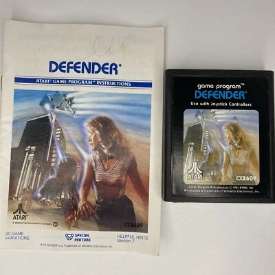 DEFENDER w/MANUAL Atari 2600 OG 1981 Game Cartridge Tested & Works Free Shipping - Image 1 of 4