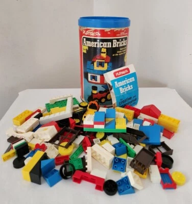 Bloques de construcción de plástico Playskool American Bricks en bote de almacenamiento vintage Foto 1 de 4
