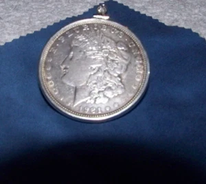 Morgan Silver Dollar in Sterling bezel on a 2mm 16–30-inch sterling necklace. - Picture 1 of 5