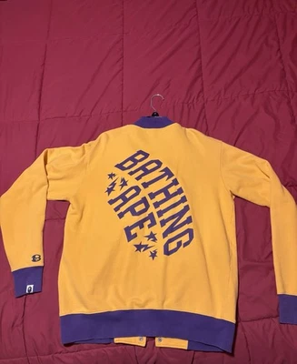 Yellow and purple BAPE varsity jacket modeled by Kanye west in size Large - Image 1 of 4